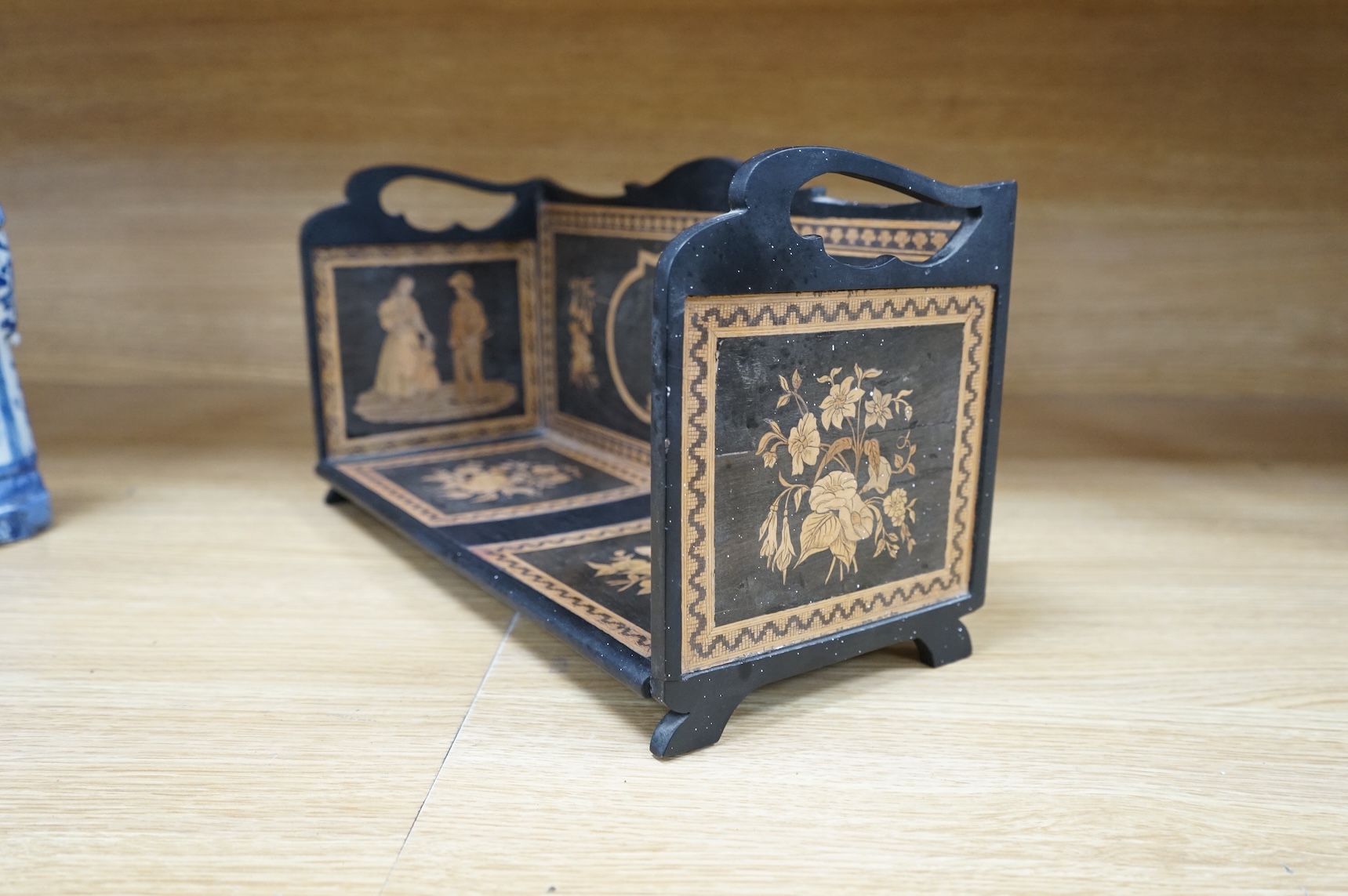 A late 19th century Sorrento ware book stand, 37.5cm wide x 20cm high